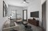 Chic and contemporary living room with elegant furniture, stylish decor, and ample natural light.