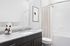 Sleek bathroom design featuring a granite countertop, modern fixtures, and a stylish shower curtain.