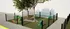 Charming fenced dog park area with a wooden bench, tree shade, and playful agility equipment, perfect for pet-friendly living.