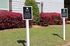 Inviting future resident parking signs amidst vibrant landscaping at Ascent at Riverdale, showcasing welcoming outdoor amenities.