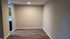 Inviting room with elegant hardwood floors and neutral walls, creating a warm and versatile space for personalization.