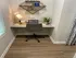 Chic and modern home office nook with a stylish desk, comfortable chair, and elegant decor, perfect for boosting productivity.