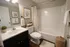 Elegant bathroom featuring modern fixtures, ample storage, and stylish decor with a serene ambiance.