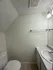 Bright and modern bathroom featuring sleek fixtures, a contemporary sink, and elegant lighting for a refreshing ambiance.