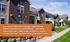 Charming Silverstone Apartment Homes nestled in a relaxing neighborhood with lush greenery and appealing brick architecture.