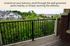 Inviting balcony with scenic views of lush green trees and elegant homes, perfect for relaxation.
