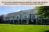 Charming Wexford Place Apartments with modern balconies and lush green lawns, set in a serene Madison neighborhood.