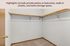 Spacious walk-in closet with ample shelving, perfect for maximizing storage and organization in your home.