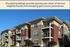 Modern apartment building with balconies, offering stunning views of Verona and nearby golf course.
