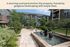 Charming apartment courtyard with lush landscaping, vibrant greenery, and a tranquil water fountain.