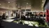 State-of-the-art gym facility with modern exercise equipment and ambient lighting.