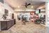 Modern fitness center with mirrored walls, free weights, and vibrant exercise balls for an invigorating workout experience.