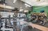 Modern fitness center with state-of-the-art exercise equipment and chic design, perfect for a complete workout experience.