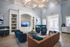 Bright and inviting lounge area with elegant seating, stylish decor, and natural light, perfect for relaxing and entertaining.