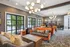Contemporary lounge space featuring elegant lighting, plush seating, and modern decor for a relaxing environment.