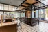 Modern upscale lounge with stylish seating, large windows, and elegant lighting.