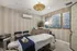 Elegant massage room featuring sophisticated wallpaper, chic artwork, and ambient lighting for ultimate relaxation.