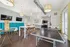 Chic and modern recreation room featuring a ping pong table, stylish seating areas, and a vibrant play setup.