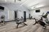 Modern fitness center with state-of-the-art equipment, sleek design, and vibrant atmosphere for an energizing workout experience.