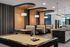 Modern and inviting game room featuring a sleek pool table, cozy booth seating, elegant pendant lighting, and a stylish counter with vibrant chairs.