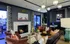 Elegant living room with a cozy fireplace, stylish decor, and plush seating, perfect for relaxation and entertaining.