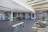Modern fitness center with state-of-the-art gym equipment, spacious layout, and motivational decor.