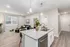 Modern open-concept living space featuring a stylish granite kitchen island, cozy living area with plush seating, and sleek wooden flooring.