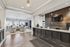 Elegant apartment lobby with a sleek reception desk, stylish seating area, and ambient lighting, offering a welcoming atmosphere.