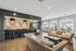 Elegant communal area with chic bar and cozy seating, perfect for entertaining in style.