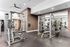 Modern fitness center with state-of-the-art gym equipment and sleek design.