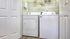 Convenient in-unit laundry with modern washer and dryer set in a cozy laundry nook.