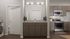 Modern apartment featuring a sleek bathroom vanity with dual sinks, adjacent to a stylish kitchen with stainless steel appliances and elegant wood cabinetry.