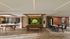 Chic and inviting apartment lounge with a modern kitchen, elegant dining area, and a cozy pool table under soft lighting. Lush green wall art with a 'It's so good to be home' sign offers a warm welcome.