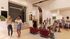 Modern and inviting apartment lobby with stylish decor, comfortable seating, and warm ambient lighting, showcasing a lively and welcoming atmosphere.