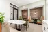 Chic dining area with stylish booths, elegant lighting, and modern decor offering a cozy ambiance.