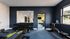 Modern fitness center with sleek exercise equipment, mirrored wall, and vibrant design for a dynamic workout experience.