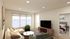 Inviting living room with elegant sofa, large TV, and abundant natural light, seamlessly connecting to a cozy bedroom.