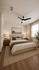 Inviting bedroom with a cozy king-sized bed, stylish decor, and soft natural lighting, ideal for relaxation and comfort.