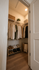 Elegant walk-in closet with organized shelving, ample hanging space, and stylish shoe storage, perfect for fashion enthusiasts.