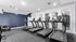 Modern fitness center featuring sleek treadmills and state-of-the-art exercise equipment in a bright and inviting space.