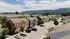 Charming row of modern townhouses with scenic mountain views and ample parking, nestled in a serene neighborhood.