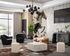 Chic living room featuring modern decor with a geometric accent wall, stylish chandelier, and elegant seating arrangement.