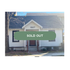 Charming single-story home with a classic exterior, now sold out. Features welcoming front porch and traditional design.