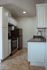 Modern kitchen featuring sleek stainless steel appliances, elegant cabinetry, and a stylish countertop.