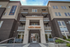 Modern apartment complex offering stylish balconies and vibrant community living at Moda Newhouse.