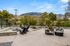 Inviting outdoor patio with modern seating and stunning mountain views, perfect for relaxation and entertainment.