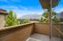 Charming balcony with scenic mountain views, perfect for relaxing and enjoying nature.