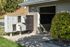 Charming mailbox area with lush greenery, offering convenience and style in a serene community setting.