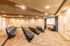 Luxurious private theater room with comfortable seating, ideal for movie nights or presentations.