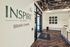 Inviting entryway of Inspire by Liberty at Briar Chapel with modern decor, artistic ceiling, and stylish flooring.